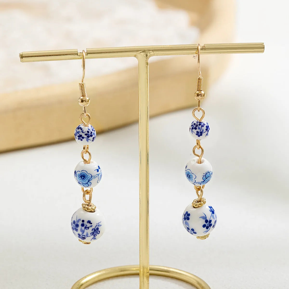 Blue and white porcelain ceramic bead long retro earrings with alloy metal geometric design