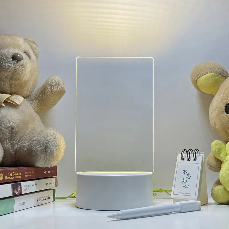Acrylic message board night lamp with warm light showing round base and multiple picture shape options