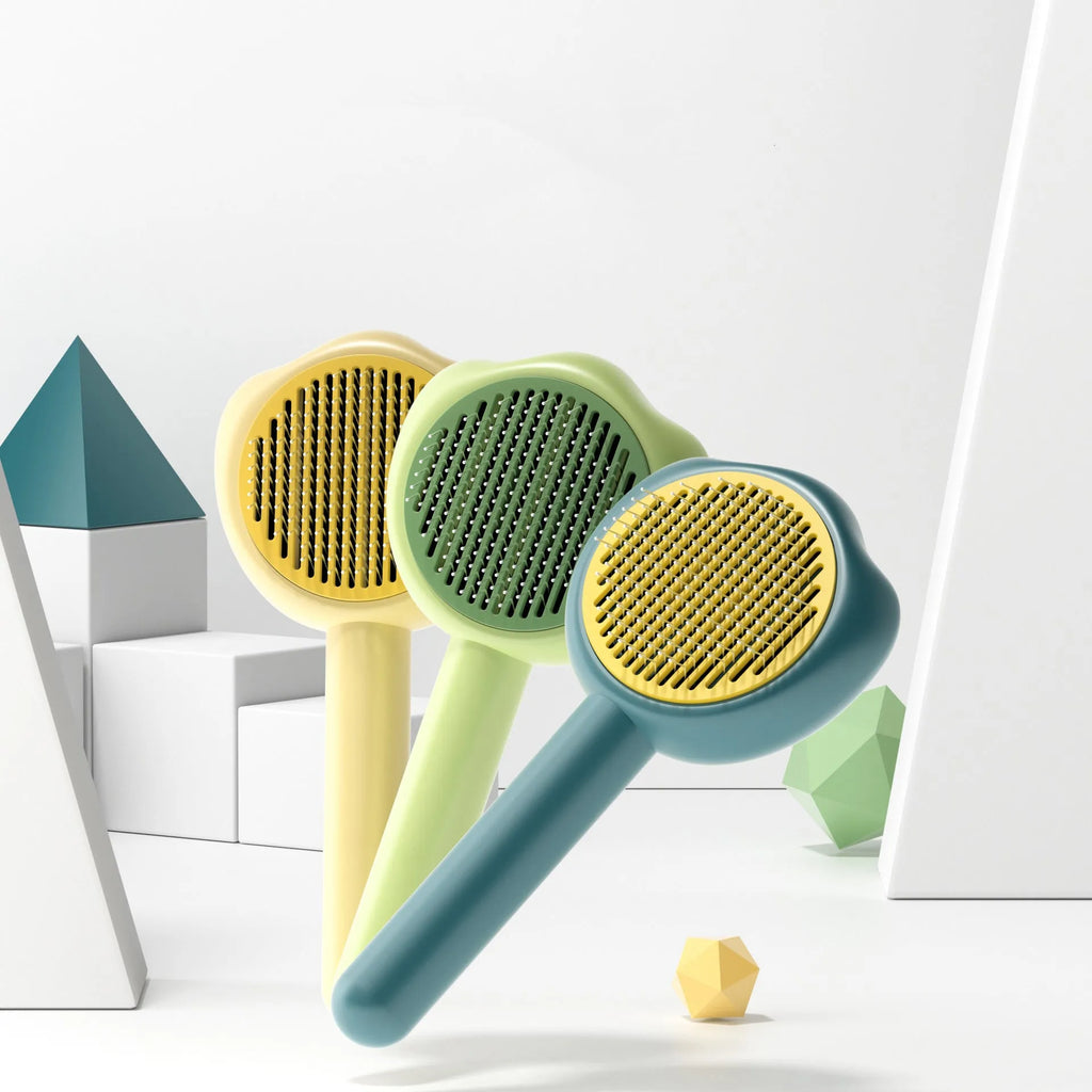 Blue pet grooming comb with self-cleaning needles showing 183mm length measurement